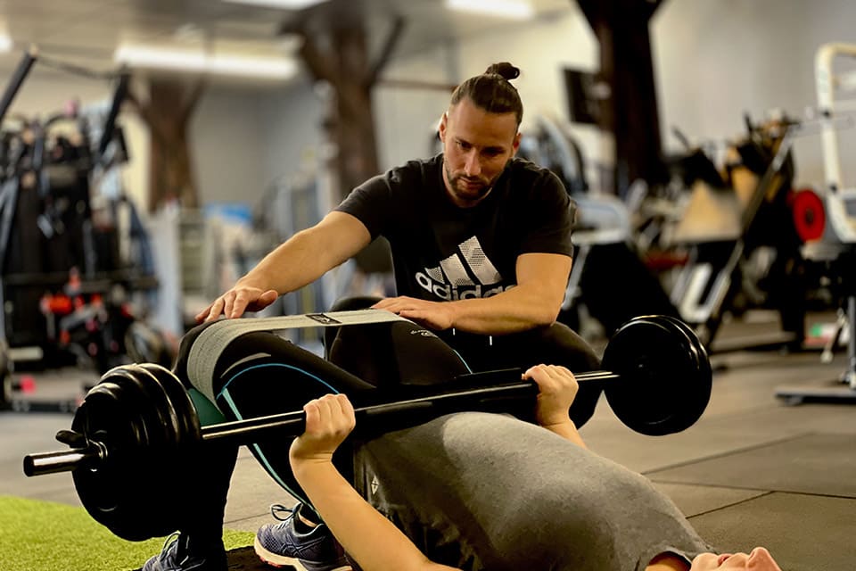 Coach sportif en salle